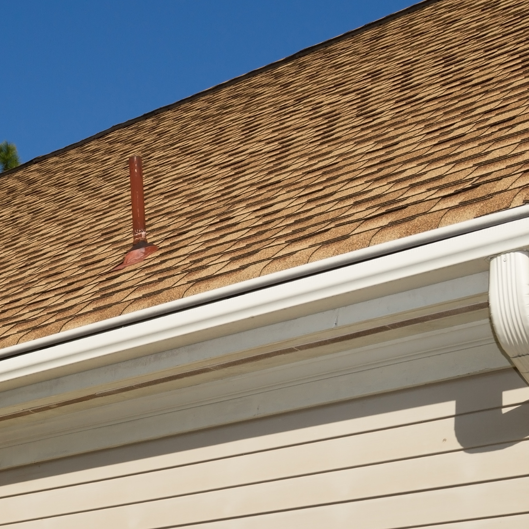 Roof vent on a house roof.