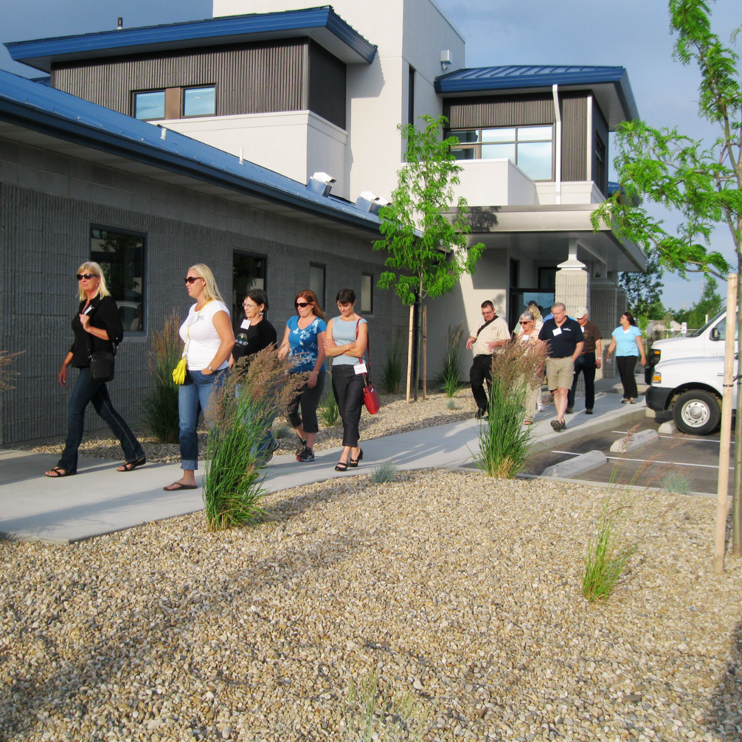 People walking around at the City of Meridian Wastewater Resource Recovery Facility on the Go with the Flow Tour